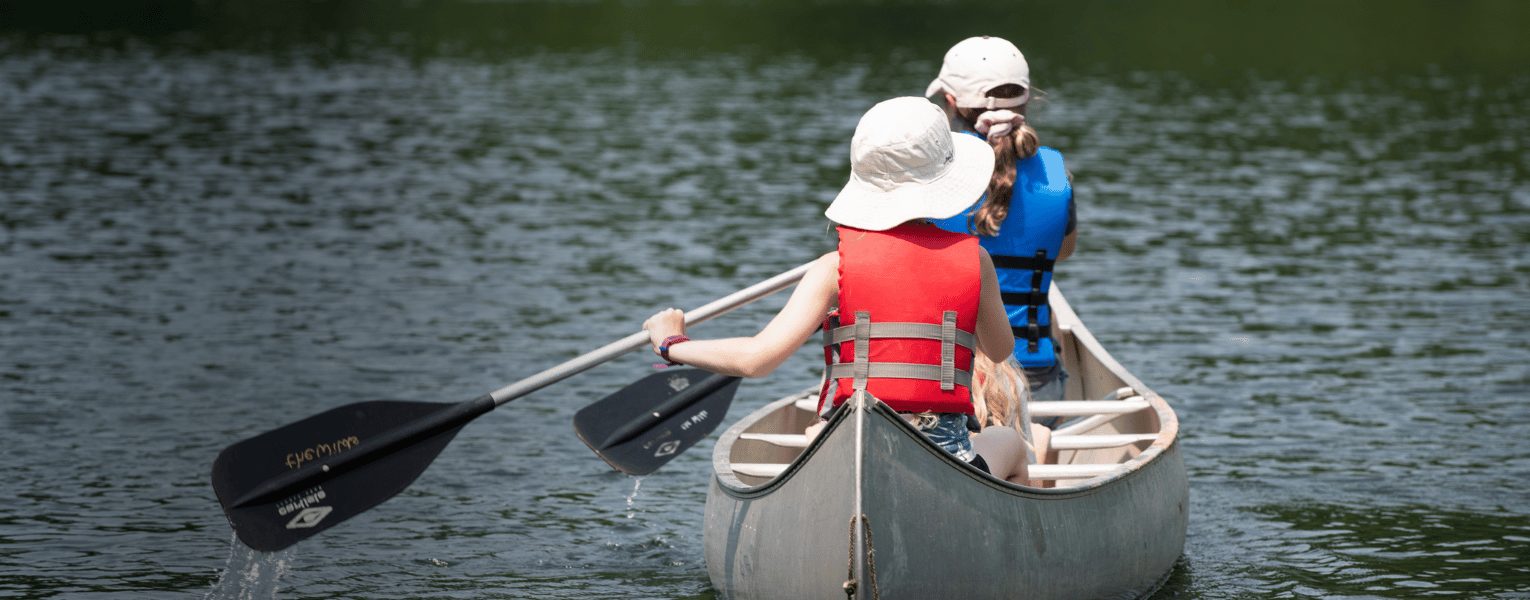 campers in canoe