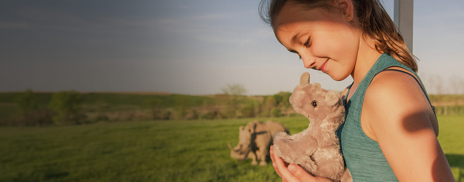 girl holding toy