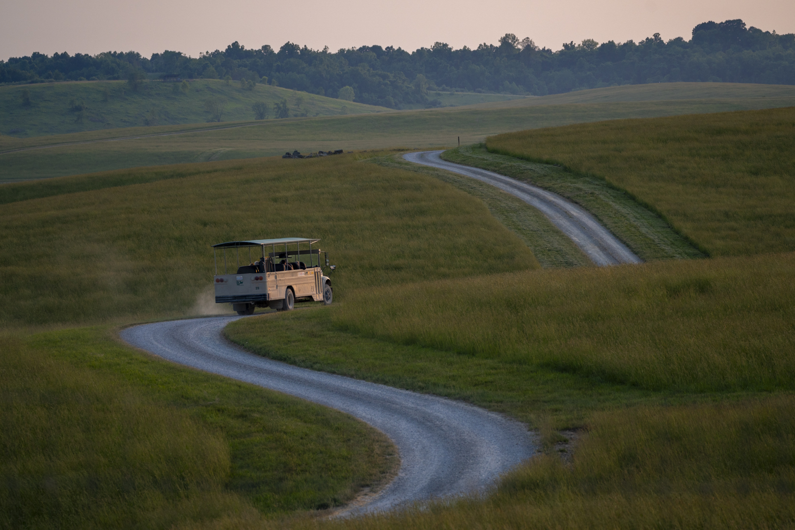 tour bus in pasture