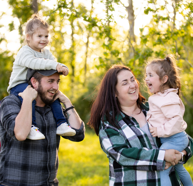 family laughing and smiling