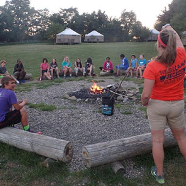 campers around campfire